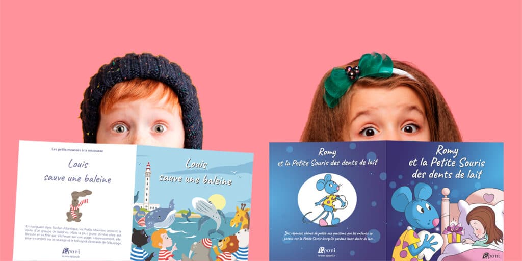 Enfants tenant un livre personnalisé